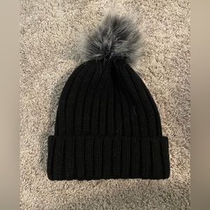 Black beanie with puff
